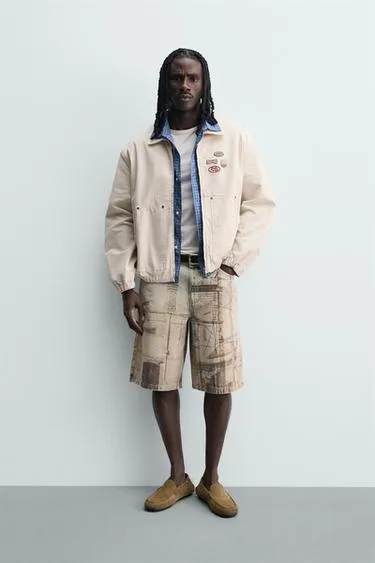 Куртка свободного кроя с нашивками- Заказать в России