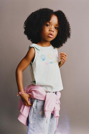 Футболка с узлом и тропической вышивкой- Заказать в России