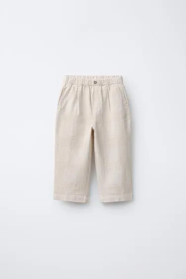 Брюки из рельефной ткани- Заказать в России