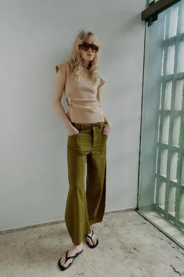 Трикотажный топ с вырезами и бусинами- Заказать в России