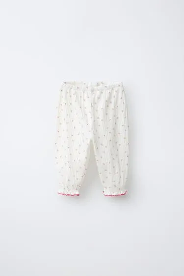 Брюки с цветочным узором и текстурой- Заказать в России