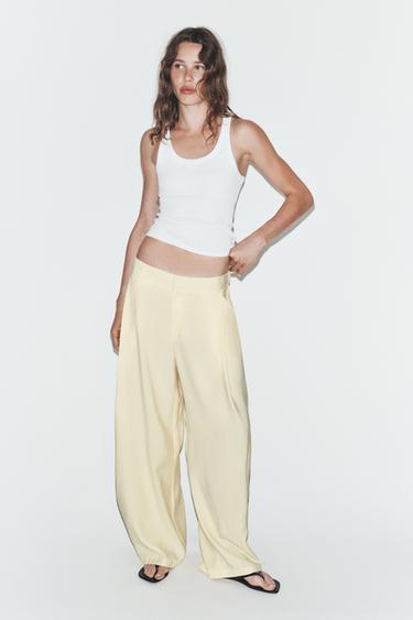 Zara Струящиеся брюки со складками купить с доставкой.