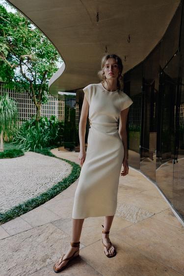 Трикотажное платье с вырезами и бусинами- Заказать в России