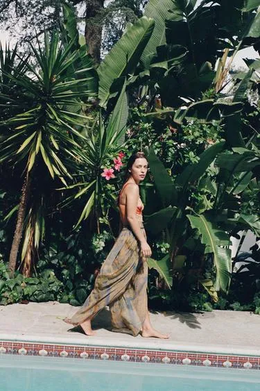 Объемные брюки с принтом и разрезами- Заказать в России