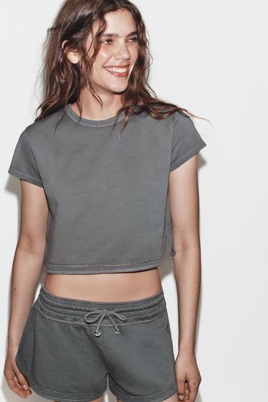 Zara Укороченная футболка с эффектом потертости купить с доставкой.