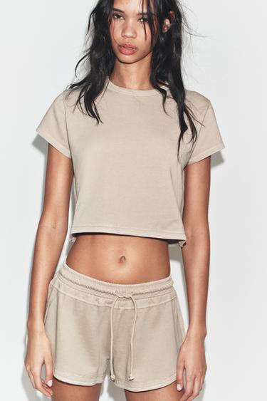 Zara Укороченная футболка с эффектом потертости купить с доставкой.