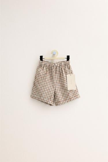 Zara ZARA «TIMELESS» - шорты в клетку из сирсекера купить с доставкой.