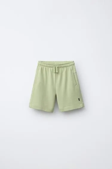 Однотонные шорты из мягкой ткани- Заказать в России