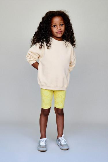 Легинсы-велосипедки в рубчик с лимонами