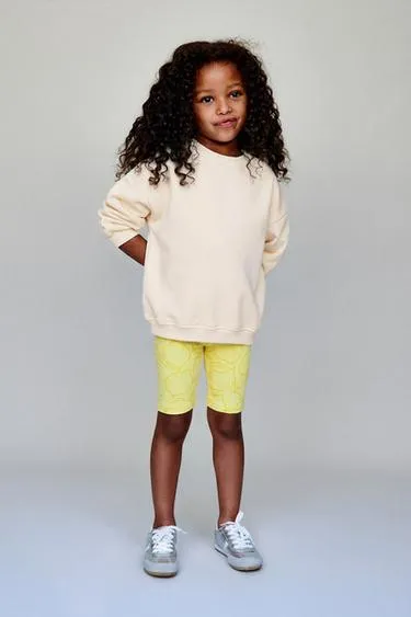 Легинсы-велосипедки в рубчик с лимонами