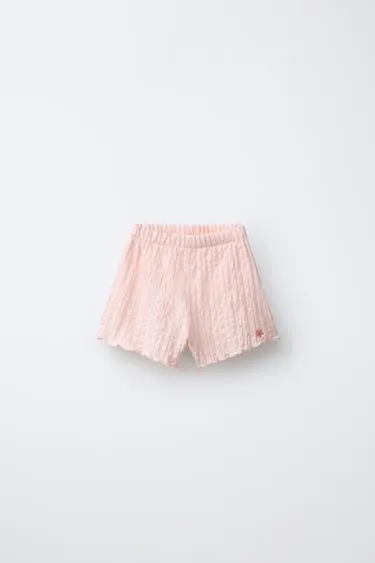 Шорты с вышивкой в виде цветка