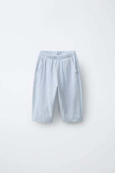 Брюки из комбинированной ткани- Заказать в России