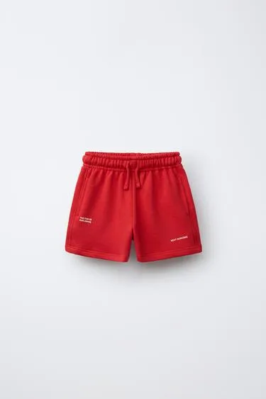 Шорты-бермуды с надписью- Заказать в России