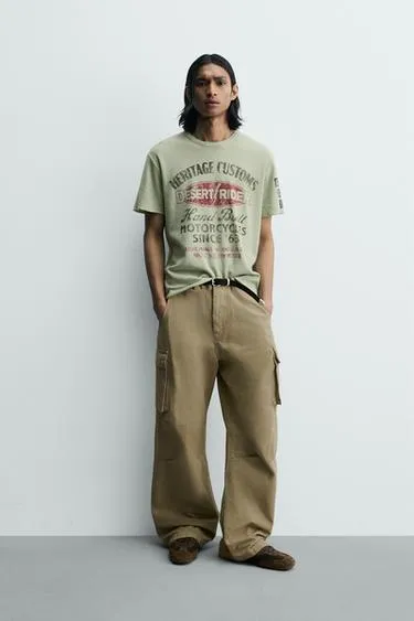 Футболка с принтами и эффектом потертости- Заказать в России