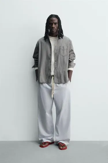 Брюки свободного кроя в полоску- Заказать в России