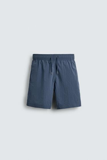 Zara Длинные плавки из технической ткани купить с доставкой.