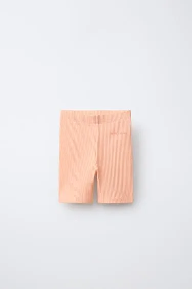 Велосипедные легинсы в рубчик с рельефной надписью