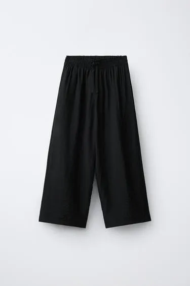 Брюки  с жатым эффектом- Заказать в России