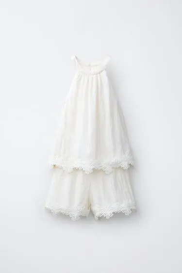 Короткий комбинезон халтер с вышивкой