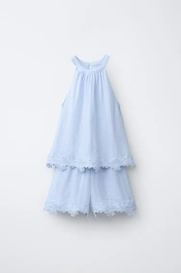 Короткий комбинезон халтер с вышивкой