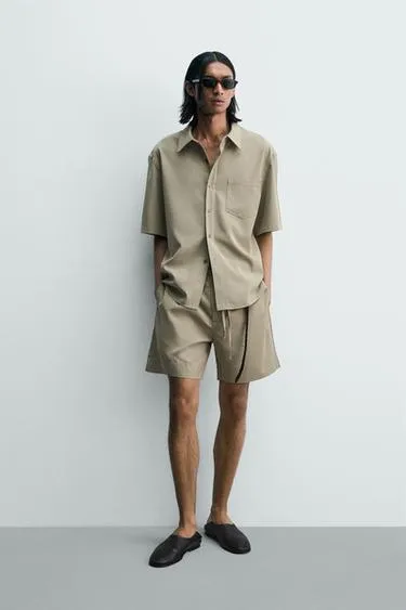 Шорты Relaxed Fit с эффектом потертости