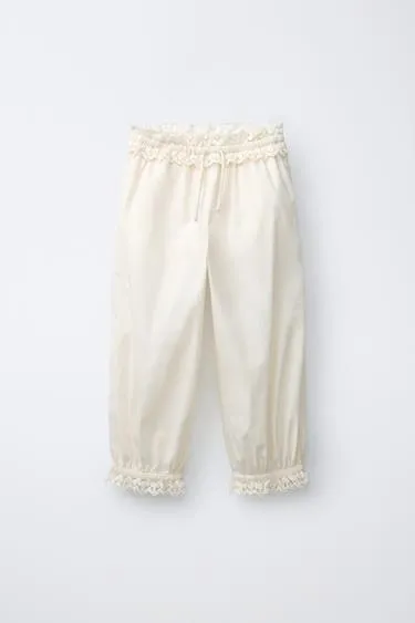 Брюки с кружевом