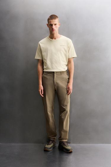 Zara Брюки GRAVEL из высокотехнологичной ткани купить с доставкой.