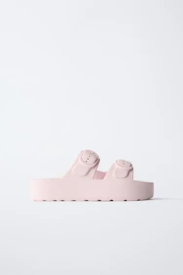 Сандалии из каучука с пряжками- Заказать в России