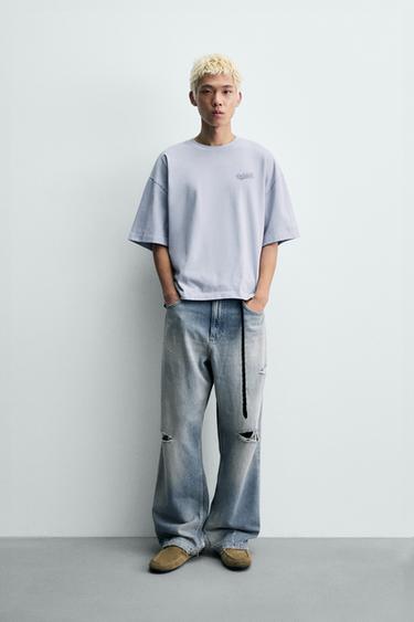 Футболка свободного кроя с контрастными нашивками- Заказать в России