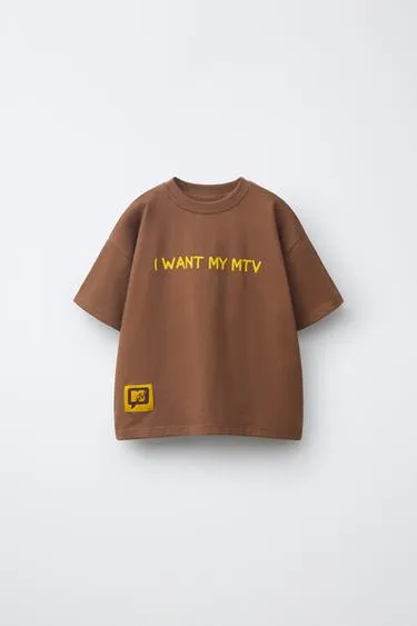 Футболка с принтом Mtv®- Заказать в России