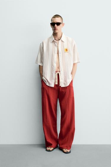 Брюки Relaxed Fit в полоску- Заказать в России