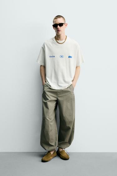 Zara Футболка с контрастными надписями купить с доставкой.