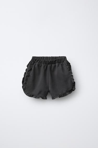 Zara Шорты-бермуды с воланами купить с доставкой.