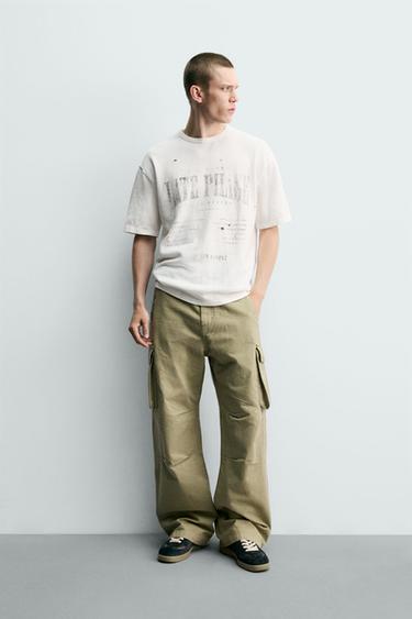Zara Футболка с принтом и эффектом потертости купить с доставкой.