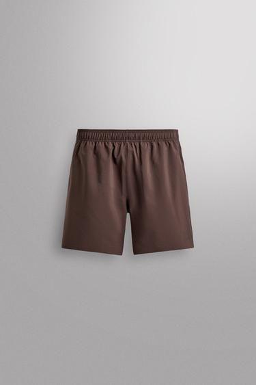 Zara Спортивные шорты 9” купить с доставкой.