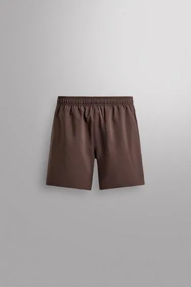 Спортивные шорты 9”