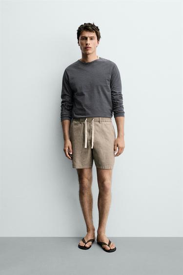 Zara Шорты  из хлопка и льна купить с доставкой.