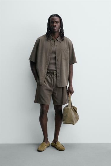 Zara Струящиеся шорты купить с доставкой.