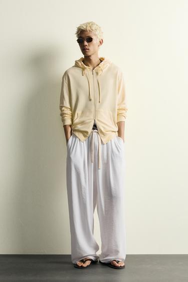 Брюки Relaxed Fit из струящейся ткани- Заказать в России