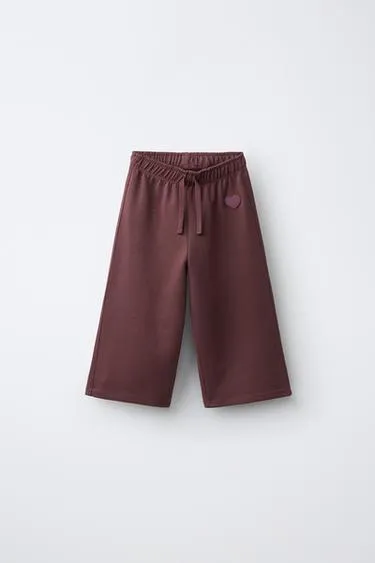 Брюки Wide Leg из мягкой ткани с декором в виде сердца- Заказать в России