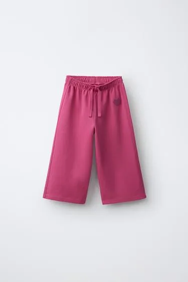 Брюки Wide Leg из мягкой ткани с сердцем- Заказать в России