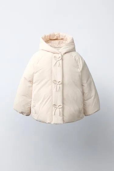 Стеганое пальто Water Repellent с бантиками- Заказать в России
