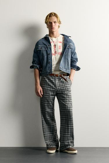 Брюки Flare Fit в клетку