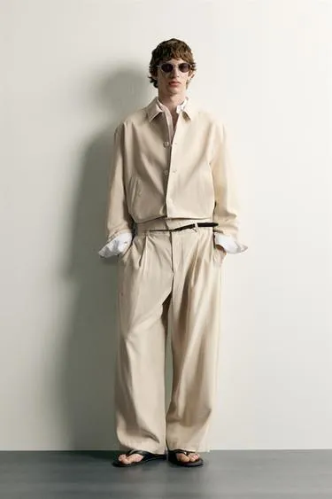 Брюки Relaxed Fit со складками- Заказать в России