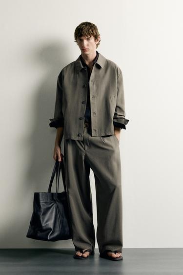 Брюки Relaxed Fit со складками- Заказать в России
