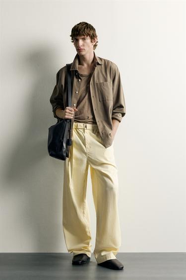 Брюки Relaxed Fit со складками и ремнем