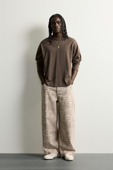 Брюки Relaxed Fit с анималистичным принтом- Заказать в России