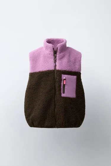 Жилет из искусственной овчины Color Block- Заказать в России