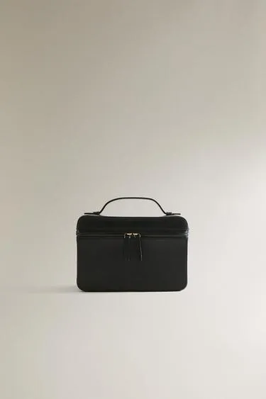 Кожаная косметичка в стиле портфеля