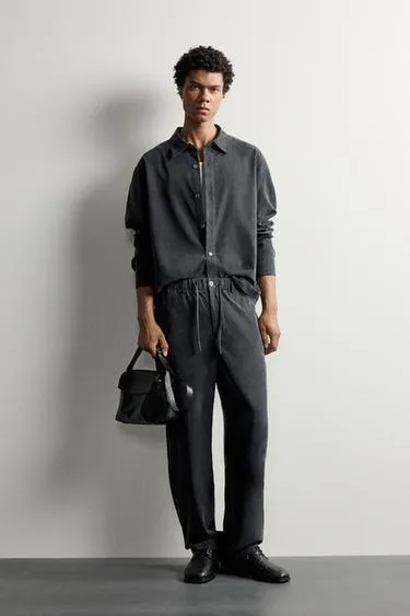 Струящиеся брюки Relaxed Fit